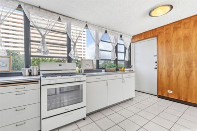 Experience convenient living in this spacious 3-bedroom condo on Honolulu Country Club in Hawaii - for sale on GolfHomes.com, golf home, golf lot