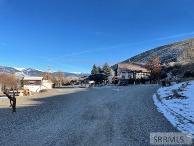 Nestled at the base of *S* Hill and adjacent to the 9th hole of on Salmon Valley Golf Course in Idaho - for sale on GolfHomes.com, golf home, golf lot