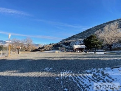 Nestled at the base of *S* Hill and adjacent to the 9th hole of on Salmon Valley Golf Course in Idaho - for sale on GolfHomes.com, golf home, golf lot