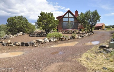 Beautiful 3BD/2BA home in the White Mountain Lakes area (short on Silver Creek Golf Club in Arizona - for sale on GolfHomes.com, golf home, golf lot