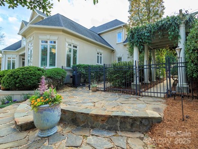 Exquisite Custom-built Estate, perfectly nestled in the on TPC at Piper Glen in North Carolina - for sale on GolfHomes.com, golf home, golf lot