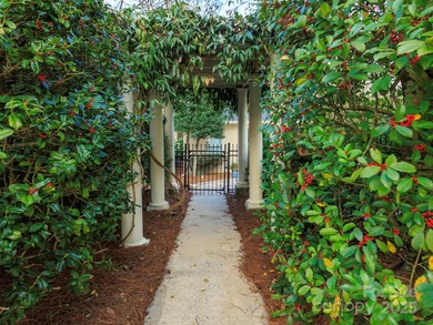 Exquisite Custom-built Estate, perfectly nestled in the on TPC at Piper Glen in North Carolina - for sale on GolfHomes.com, golf home, golf lot