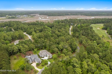 This quiet lot is tucked away on a cul-de-sac in the prestigious on Rivers Edge Golf Club in North Carolina - for sale on GolfHomes.com, golf home, golf lot