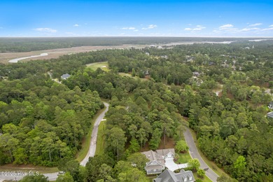 This quiet lot is tucked away on a cul-de-sac in the prestigious on Rivers Edge Golf Club in North Carolina - for sale on GolfHomes.com, golf home, golf lot