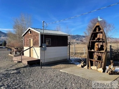 Nestled at the base of *S* Hill and adjacent to the 9th hole of on Salmon Valley Golf Course in Idaho - for sale on GolfHomes.com, golf home, golf lot