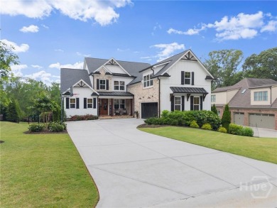 Stunning custom home on the 13th fairway in Traditions of on Traditions of Braselton Golf Club in Georgia - for sale on GolfHomes.com, golf home, golf lot
