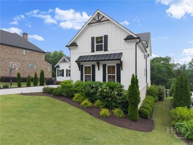 Stunning custom home on the 13th fairway in Traditions of on Traditions of Braselton Golf Club in Georgia - for sale on GolfHomes.com, golf home, golf lot