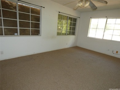 Situated on a nicely sized flag lot in Ewa Villages close to on Coral Creek Golf Course in Hawaii - for sale on GolfHomes.com, golf home, golf lot