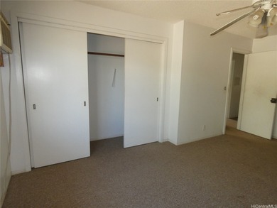 Situated on a nicely sized flag lot in Ewa Villages close to on Coral Creek Golf Course in Hawaii - for sale on GolfHomes.com, golf home, golf lot