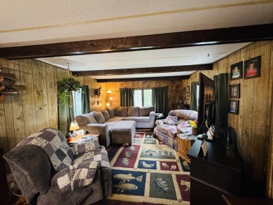Welcome to your Lake Arrowhead getaway! This charming mobile on Sand Valley Golf Course in Wisconsin - for sale on GolfHomes.com, golf home, golf lot