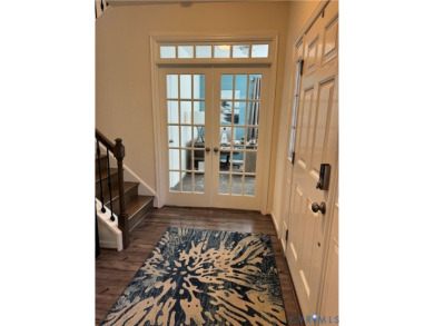 This stunning end-unit townhome in the Magnolia Green community on The Westham Golf Club At Magnolia Green in Virginia - for sale on GolfHomes.com, golf home, golf lot