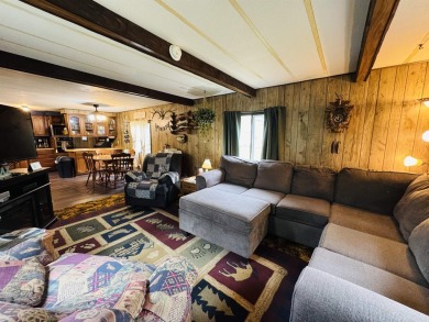 Welcome to your Lake Arrowhead getaway! This charming mobile on Sand Valley Golf Course in Wisconsin - for sale on GolfHomes.com, golf home, golf lot