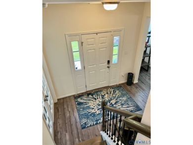 This stunning end-unit townhome in the Magnolia Green community on The Westham Golf Club At Magnolia Green in Virginia - for sale on GolfHomes.com, golf home, golf lot