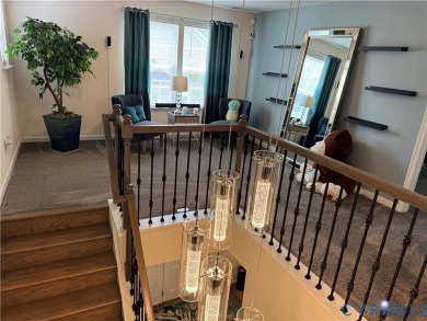 This stunning end-unit townhome in the Magnolia Green community on The Westham Golf Club At Magnolia Green in Virginia - for sale on GolfHomes.com, golf home, golf lot