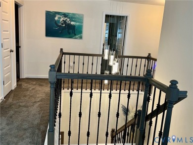 This stunning end-unit townhome in the Magnolia Green community on The Westham Golf Club At Magnolia Green in Virginia - for sale on GolfHomes.com, golf home, golf lot