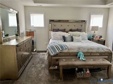 This stunning end-unit townhome in the Magnolia Green community on The Westham Golf Club At Magnolia Green in Virginia - for sale on GolfHomes.com, golf home, golf lot