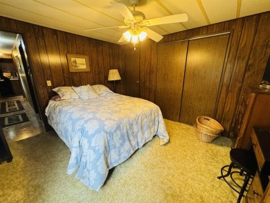 Welcome to your Lake Arrowhead getaway! This charming mobile on Sand Valley Golf Course in Wisconsin - for sale on GolfHomes.com, golf home, golf lot
