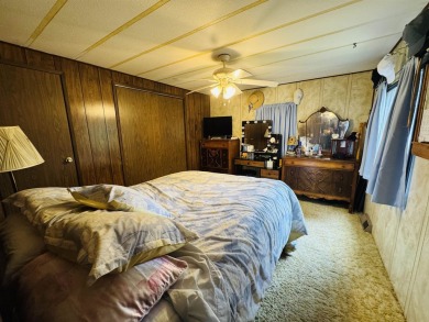 Welcome to your Lake Arrowhead getaway! This charming mobile on Sand Valley Golf Course in Wisconsin - for sale on GolfHomes.com, golf home, golf lot