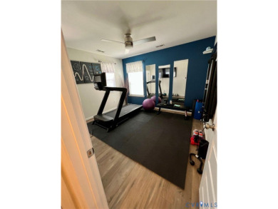 This stunning end-unit townhome in the Magnolia Green community on The Westham Golf Club At Magnolia Green in Virginia - for sale on GolfHomes.com, golf home, golf lot