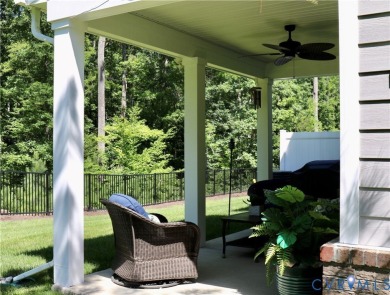 This stunning end-unit townhome in the Magnolia Green community on The Westham Golf Club At Magnolia Green in Virginia - for sale on GolfHomes.com, golf home, golf lot