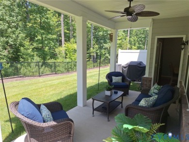 This stunning end-unit townhome in the Magnolia Green community on The Westham Golf Club At Magnolia Green in Virginia - for sale on GolfHomes.com, golf home, golf lot