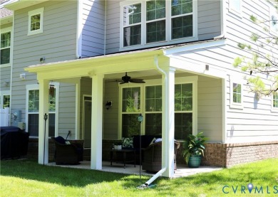 This stunning end-unit townhome in the Magnolia Green community on The Westham Golf Club At Magnolia Green in Virginia - for sale on GolfHomes.com, golf home, golf lot