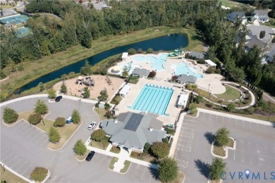 This stunning end-unit townhome in the Magnolia Green community on The Westham Golf Club At Magnolia Green in Virginia - for sale on GolfHomes.com, golf home, golf lot