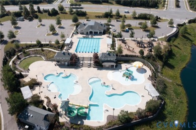 This stunning end-unit townhome in the Magnolia Green community on The Westham Golf Club At Magnolia Green in Virginia - for sale on GolfHomes.com, golf home, golf lot