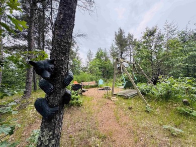 Welcome to your Lake Arrowhead getaway! This charming mobile on Sand Valley Golf Course in Wisconsin - for sale on GolfHomes.com, golf home, golf lot