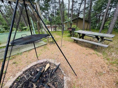 Welcome to your Lake Arrowhead getaway! This charming mobile on Sand Valley Golf Course in Wisconsin - for sale on GolfHomes.com, golf home, golf lot