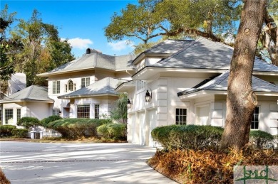 From stunning curb appeal to breathtaking views across 2 lagoons on The Landings Club - Palmetto in Georgia - for sale on GolfHomes.com, golf home, golf lot