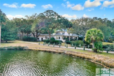 From stunning curb appeal to breathtaking views across 2 lagoons on The Landings Club - Palmetto in Georgia - for sale on GolfHomes.com, golf home, golf lot