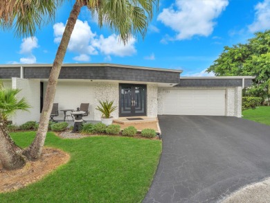 Spacious 3BR/2.5BA home in the prestigious Woodlands of Tamarac on Woodlands Country Club in Florida - for sale on GolfHomes.com, golf home, golf lot