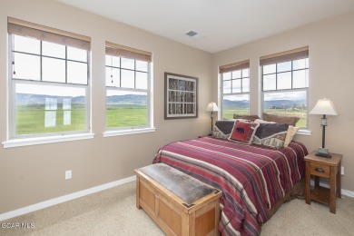 Experience the best of Aspen Meadows in this stunning 2-bedroom on Headwaters Golf Course At Granby Ranch in Colorado - for sale on GolfHomes.com, golf home, golf lot