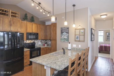 Experience the best of Aspen Meadows in this stunning 2-bedroom on Headwaters Golf Course At Granby Ranch in Colorado - for sale on GolfHomes.com, golf home, golf lot
