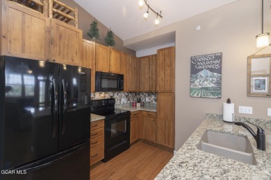 Experience the best of Aspen Meadows in this stunning 2-bedroom on Headwaters Golf Course At Granby Ranch in Colorado - for sale on GolfHomes.com, golf home, golf lot