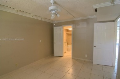 BEAUTIFUL 2 BED, 2 BATH FIRST FLOOR CONDO W GORGEOUS WATER VIEWS on Pine Island Ridge Country Club in Florida - for sale on GolfHomes.com, golf home, golf lot