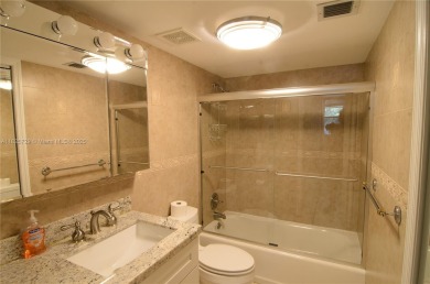BEAUTIFUL 2 BED, 2 BATH FIRST FLOOR CONDO W GORGEOUS WATER VIEWS on Pine Island Ridge Country Club in Florida - for sale on GolfHomes.com, golf home, golf lot