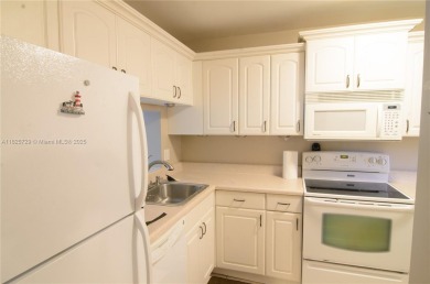 BEAUTIFUL 2 BED, 2 BATH FIRST FLOOR CONDO W GORGEOUS WATER VIEWS on Pine Island Ridge Country Club in Florida - for sale on GolfHomes.com, golf home, golf lot