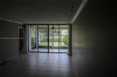 BEAUTIFUL 2 BED, 2 BATH FIRST FLOOR CONDO W GORGEOUS WATER VIEWS on Pine Island Ridge Country Club in Florida - for sale on GolfHomes.com, golf home, golf lot