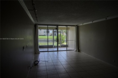 BEAUTIFUL 2 BED, 2 BATH FIRST FLOOR CONDO W GORGEOUS WATER VIEWS on Pine Island Ridge Country Club in Florida - for sale on GolfHomes.com, golf home, golf lot