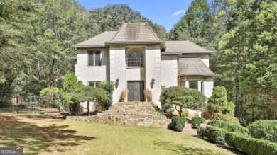 Welcome to this exquisite Stoney Brook home offering 5 bedrooms on Canongate At Flat Creek Club in Georgia - for sale on GolfHomes.com, golf home, golf lot