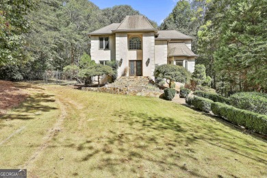 Welcome to this exquisite Stoney Brook home offering 5 bedrooms on Canongate At Flat Creek Club in Georgia - for sale on GolfHomes.com, golf home, golf lot