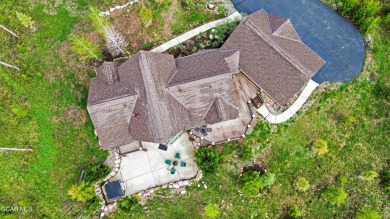 Set back on a flat 2-acre lot overlooking the 3rd Fairway at the on Pole Creek Golf Club in Colorado - for sale on GolfHomes.com, golf home, golf lot