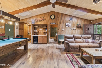 Charming single-level cabin in Pinetop Country Club, offering 1 on Pinetop Lakes Country Club in Arizona - for sale on GolfHomes.com, golf home, golf lot