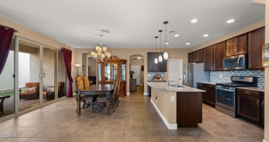 Step inside this beautifully updated 4-bedroom, 3.5-bathroom on Verrado Golf Club  in Arizona - for sale on GolfHomes.com, golf home, golf lot