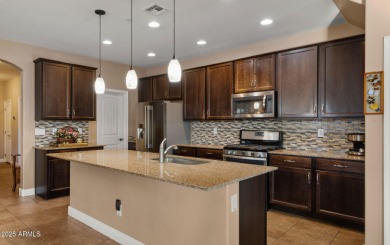 Step inside this beautifully updated 4-bedroom, 3.5-bathroom on Verrado Golf Club  in Arizona - for sale on GolfHomes.com, golf home, golf lot