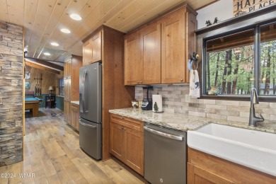 Charming single-level cabin in Pinetop Country Club, offering 1 on Pinetop Lakes Country Club in Arizona - for sale on GolfHomes.com, golf home, golf lot