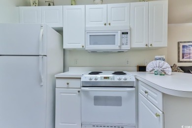 Welcome to 4860 Carnation Circle, Unit 203, a charming 1-bedroom on Myrtlewood Golf Course and Club  in South Carolina - for sale on GolfHomes.com, golf home, golf lot