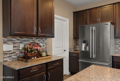 Step inside this beautifully updated 4-bedroom, 3.5-bathroom on Verrado Golf Club  in Arizona - for sale on GolfHomes.com, golf home, golf lot